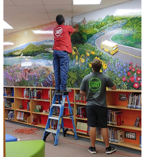 Installing Murals at Ott Elementary Library